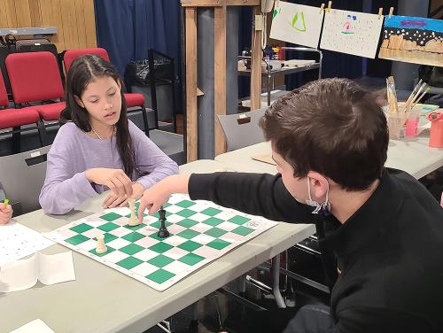 Kyle teaches chess to a girl who attends a competive tournaments on weekend