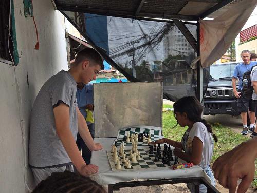 Kyle loves teaching chess in Panama streets