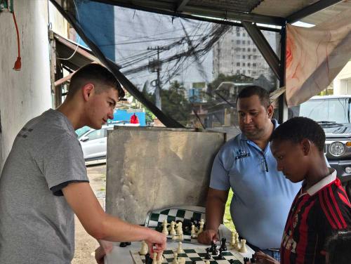 Kyle teaches chess in Panama