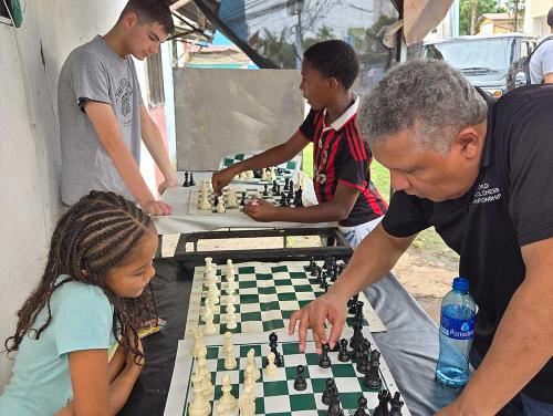 Playing chess in Panama shanty town